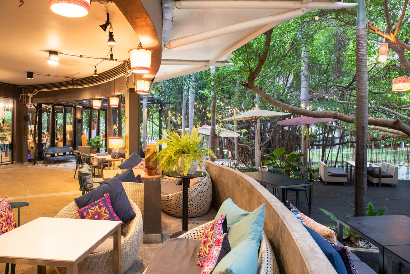 Outdoor garden lounge deck lit up in the evening