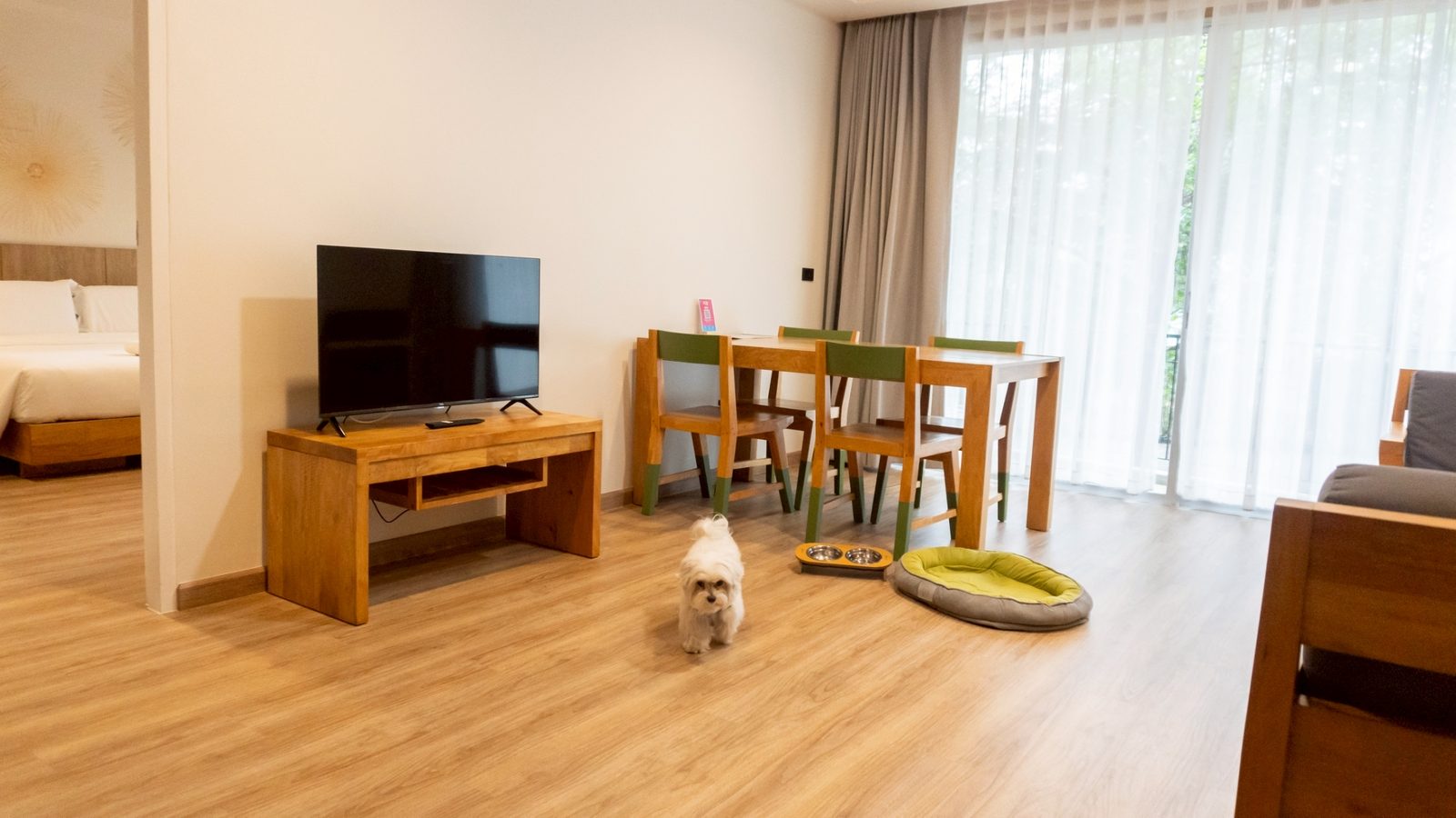 Pet-Friendly Suite living room with guest's dog