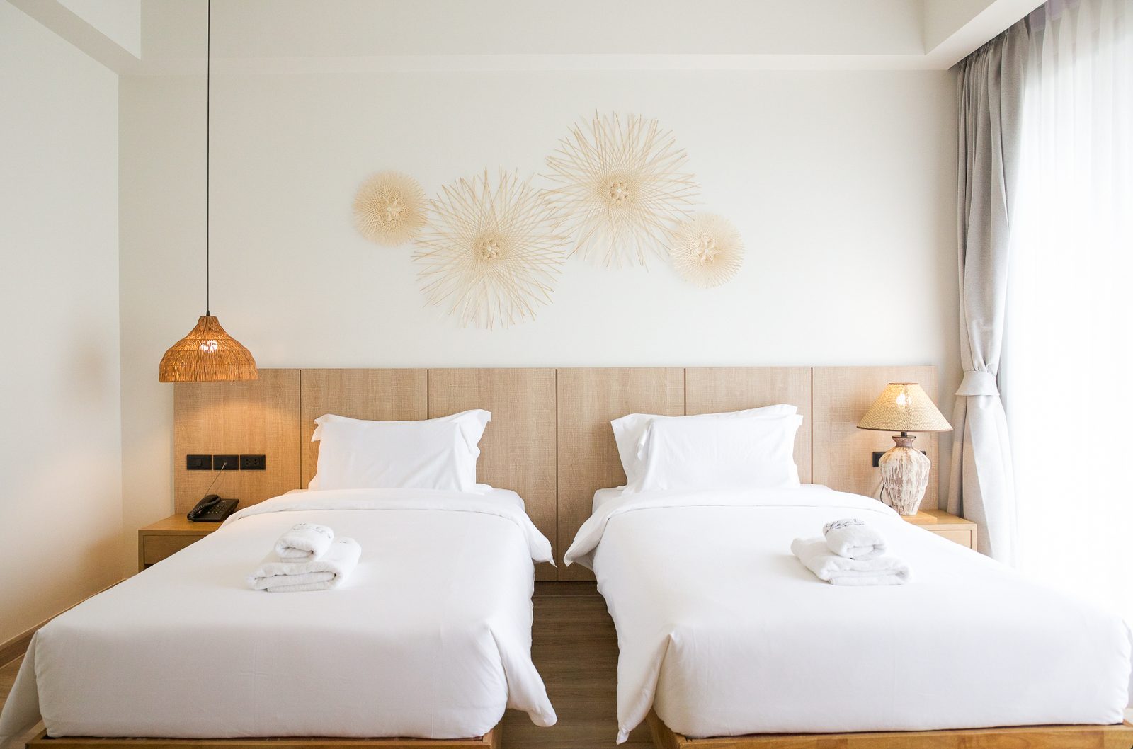 Twin beds in a Leela Signature Room